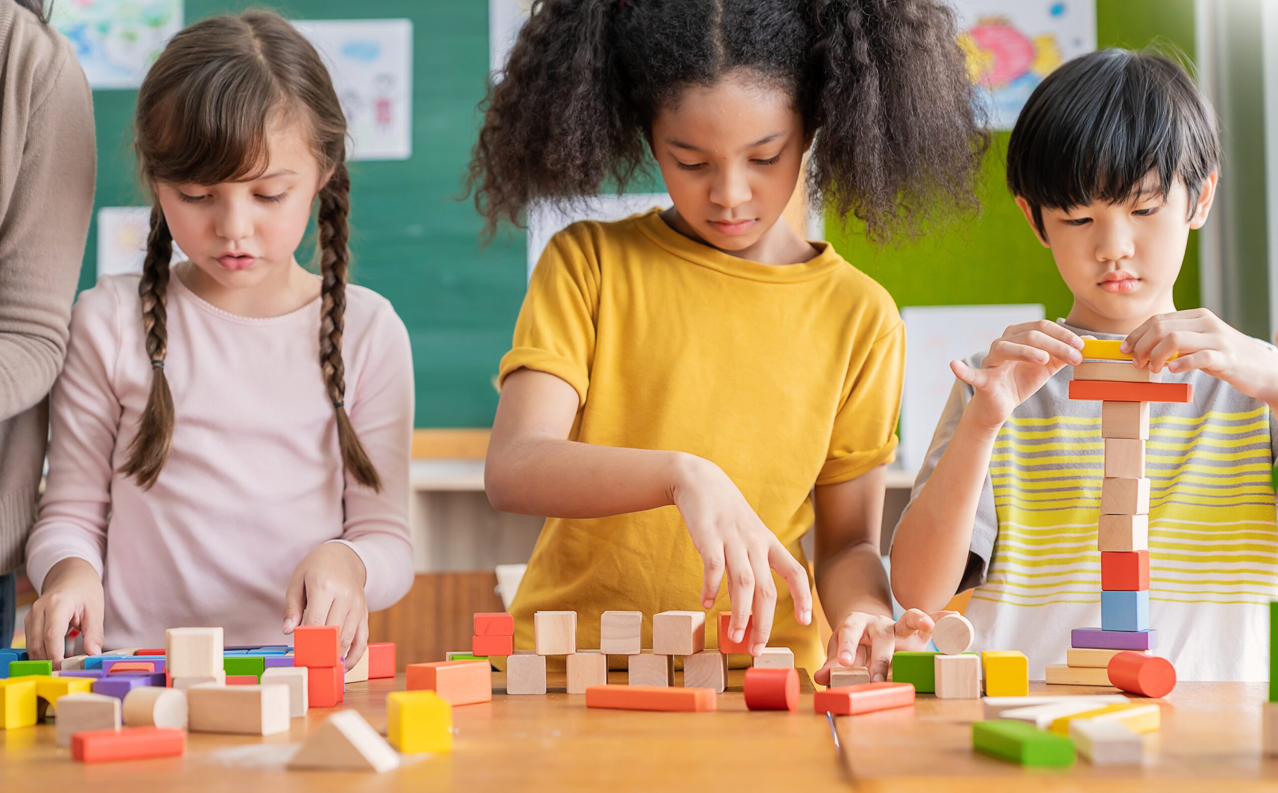 children-building-with-wooden-blocks-at-school-2026-01-05-04-57-58-utc